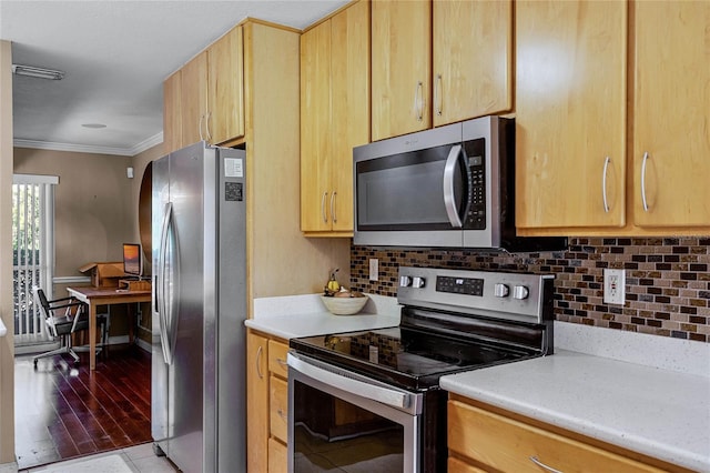 kitchen featuring light tile patterned floors, decorative backsplash, ornamental molding, and stainless steel appliances