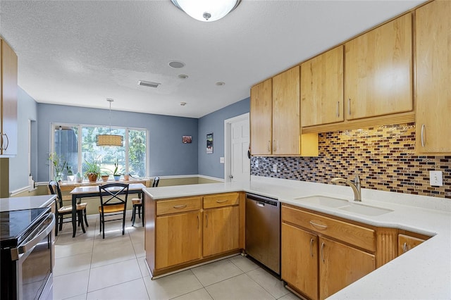 kitchen featuring sink, light tile patterned floors, hanging light fixtures, stainless steel appliances, and kitchen peninsula