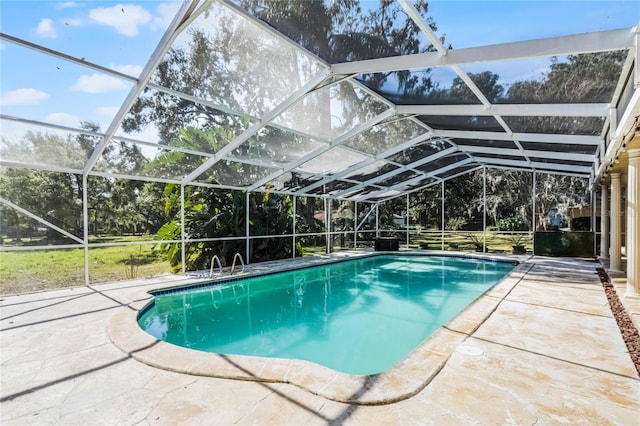 view of pool featuring a patio and a lanai