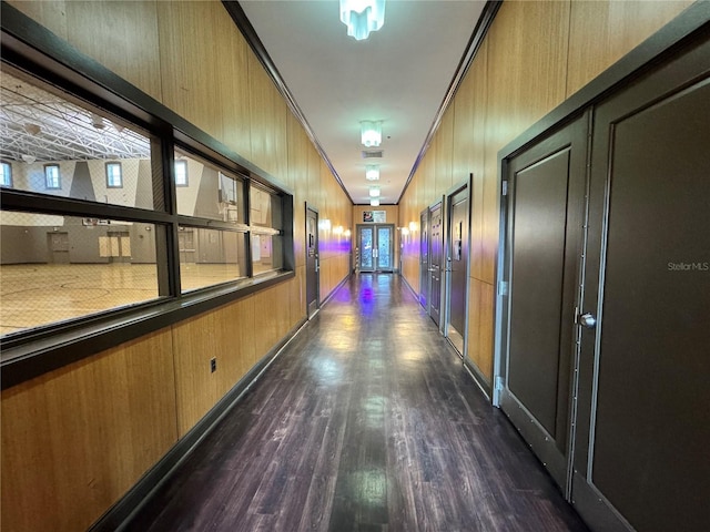 corridor with dark wood-type flooring