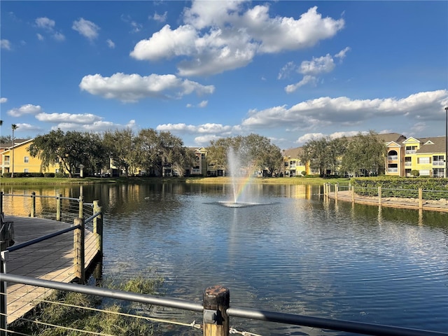 view of dock with a water view