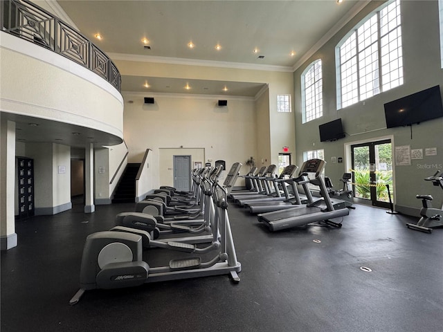 2328 Midtown Ter Unit 1024, Orlando, FL 32839 - exercise room with ornamental molding, a towering ceiling, french doors, and recessed lighting