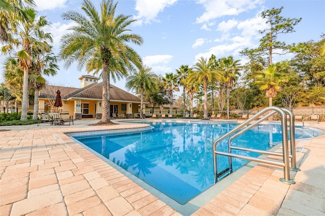 view of pool featuring a patio