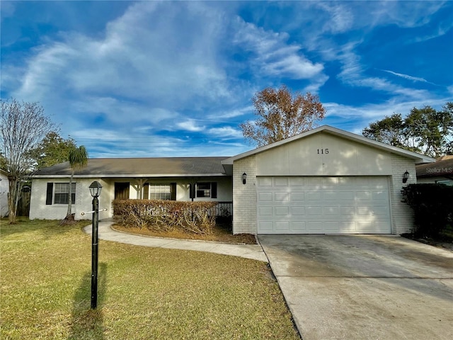 ranch-style house featuring a garage and a front yard