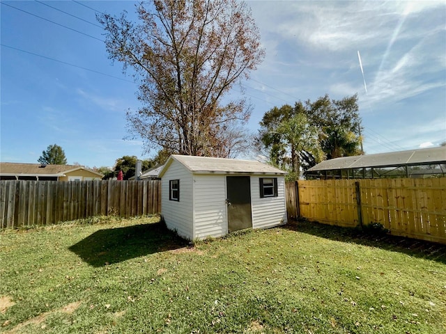 view of outdoor structure with a lawn