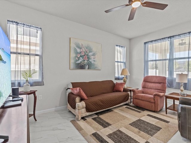 living room featuring ceiling fan