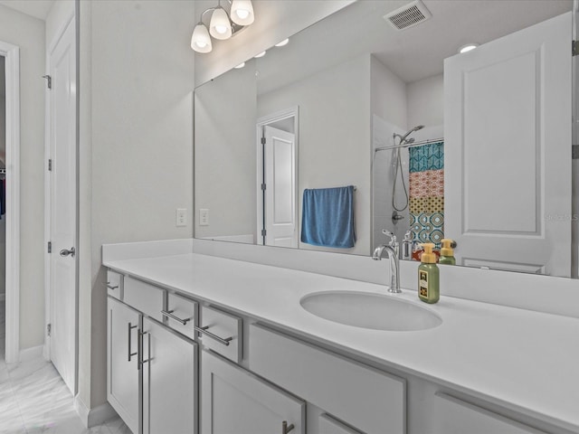 bathroom featuring vanity and a shower with curtain