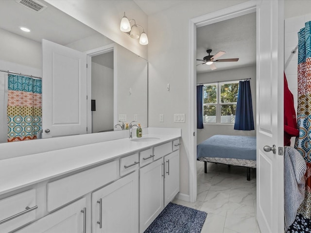 bathroom featuring vanity and ceiling fan