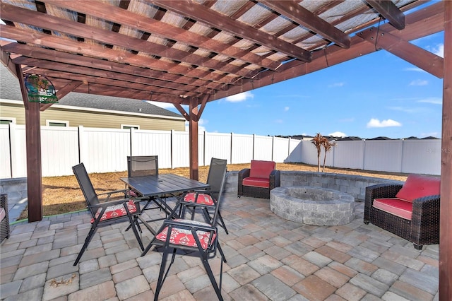 view of patio featuring a pergola and an outdoor fire pit