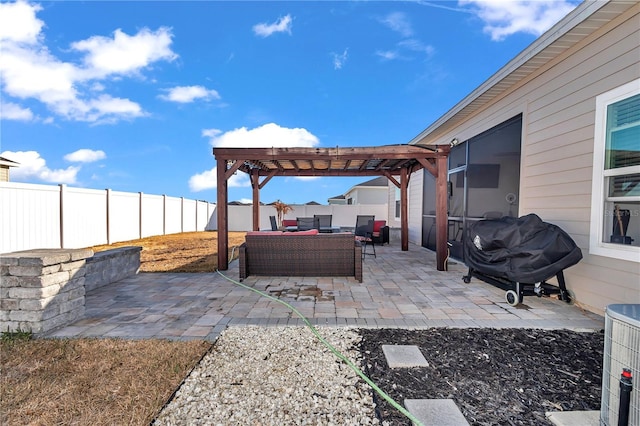 view of patio with a grill, an outdoor hangout area, and a pergola