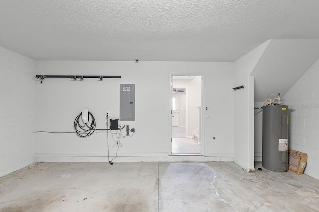 garage with water heater and electric panel