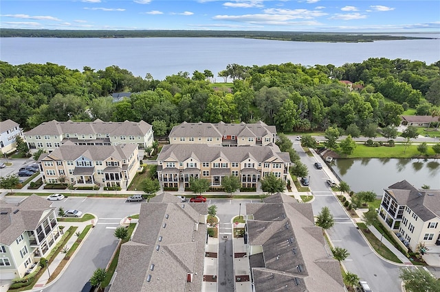 bird's eye view with a water view