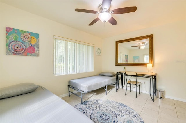 bedroom featuring ceiling fan and light tile patterned floors