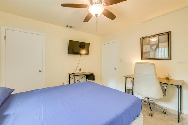 carpeted bedroom with ceiling fan