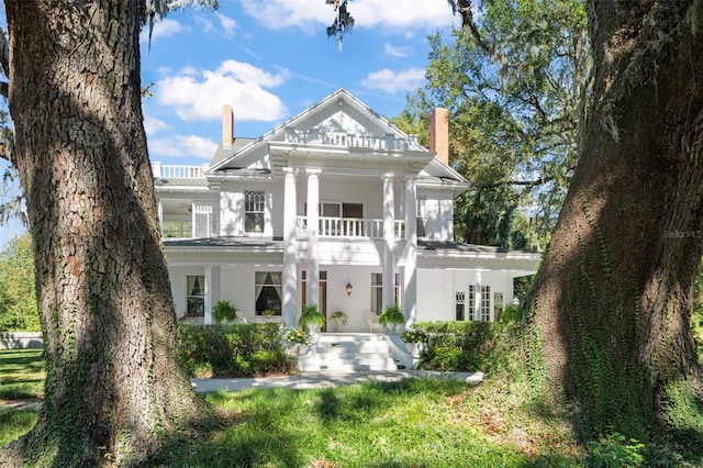 view of greek revival inspired property