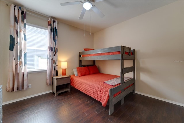 bedroom featuring dark hardwood / wood-style flooring and ceiling fan