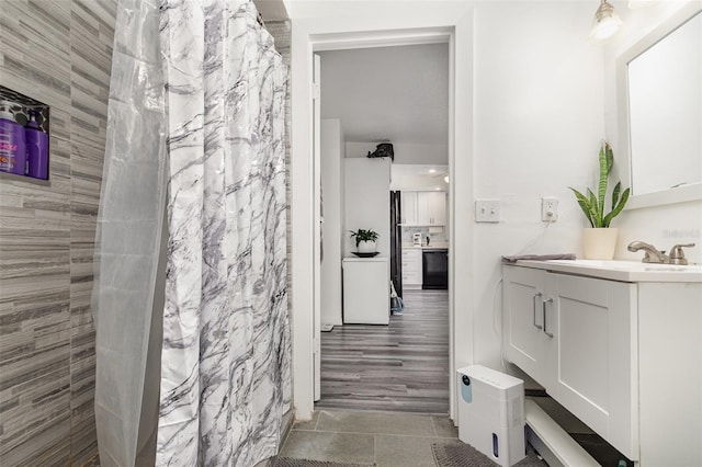 bathroom featuring vanity and walk in shower