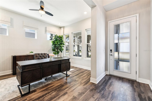 entryway featuring dark wood-type flooring and ceiling fan