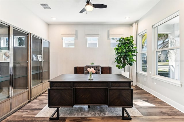 office area featuring hardwood / wood-style flooring, ceiling fan, and a healthy amount of sunlight