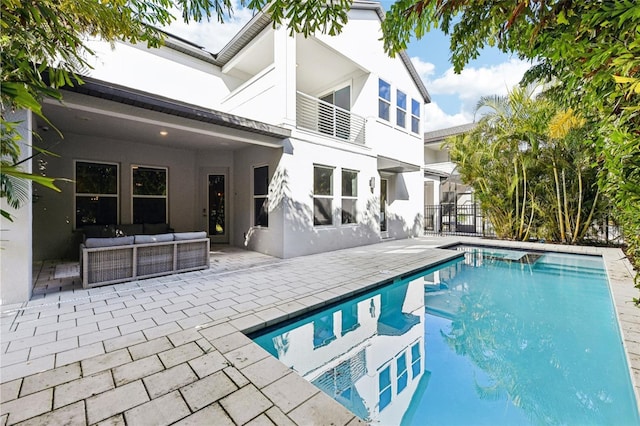 view of swimming pool with an outdoor hangout area and a patio area