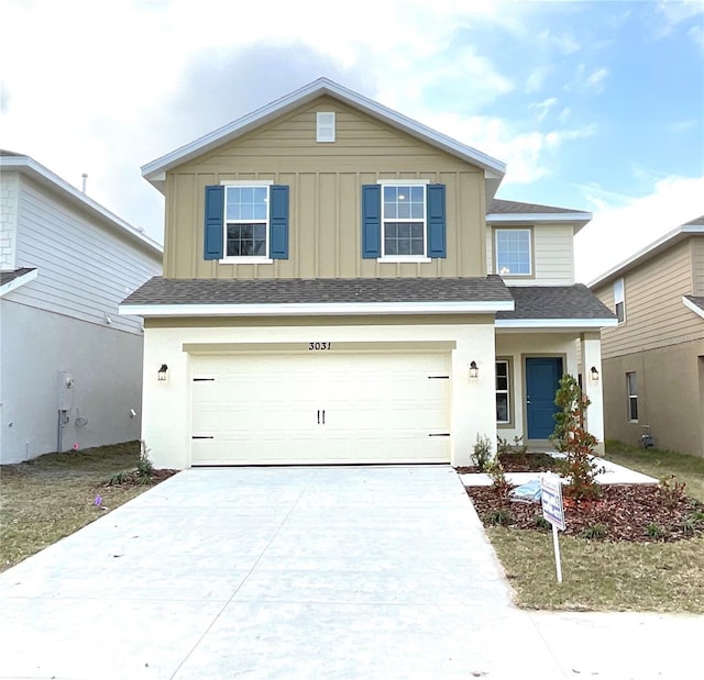 view of front of property with a garage