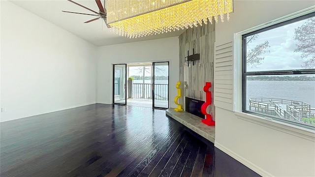 mudroom featuring wood finished floors and baseboards