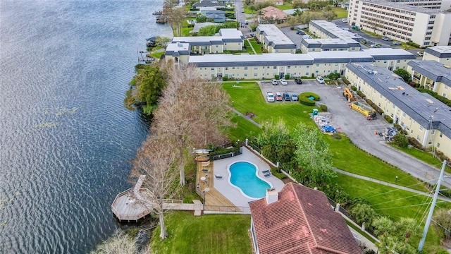 birds eye view of property featuring a water view