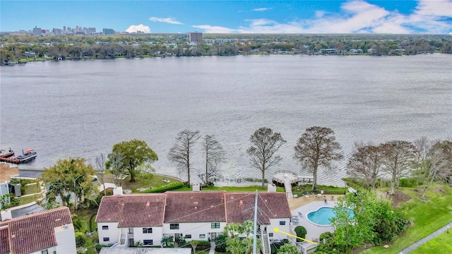 drone / aerial view with a water view