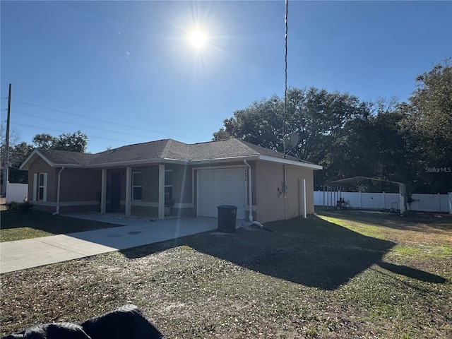 view of side of property with a garage