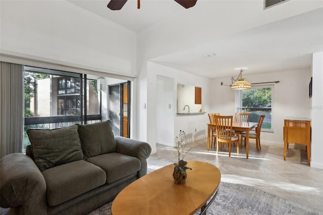 living room featuring ceiling fan