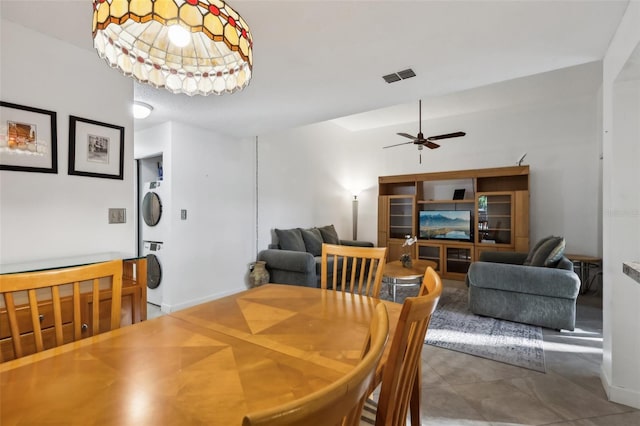 dining room featuring ceiling fan