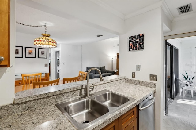 kitchen with sink, crown molding, light tile patterned floors, dishwasher, and decorative light fixtures