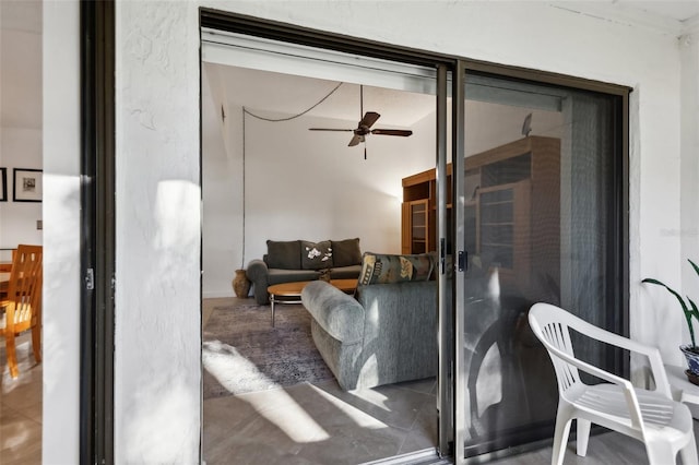 interior space featuring ceiling fan