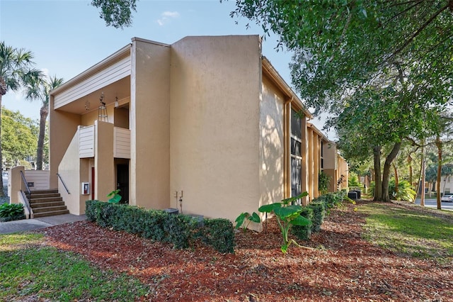 view of property exterior with a balcony