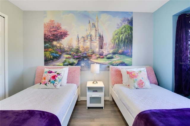 bedroom with wood-type flooring