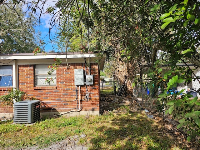 view of property exterior with cooling unit