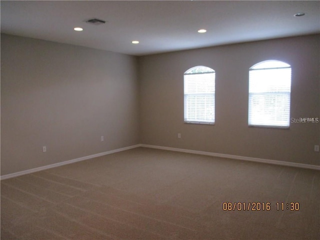 view of carpeted spare room