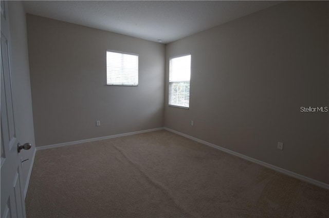 view of carpeted spare room