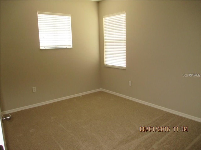 view of carpeted spare room