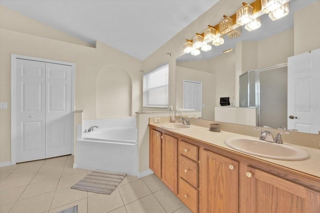 bathroom with tile patterned flooring, vanity, lofted ceiling, and separate shower and tub