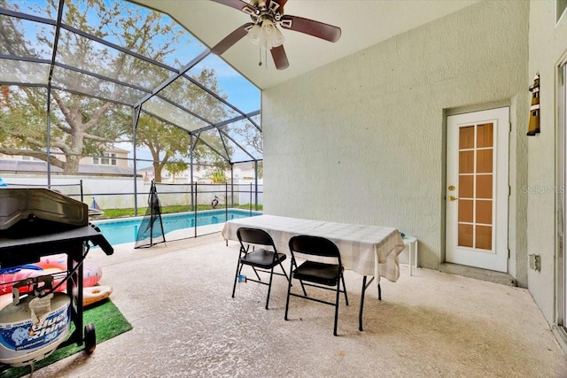 view of patio / terrace featuring a fenced in pool and a lanai