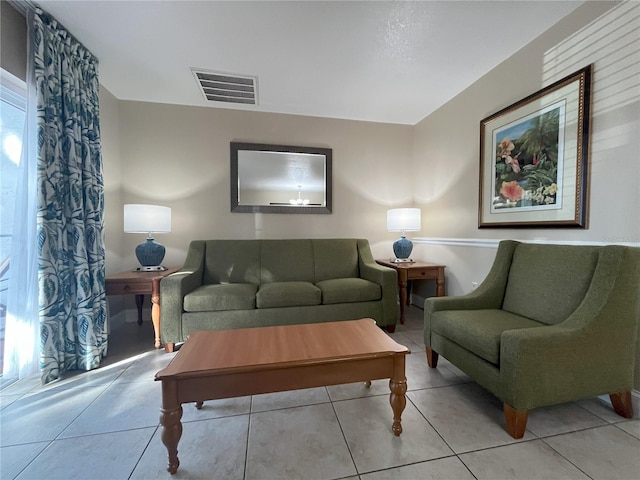 living room featuring light tile patterned floors