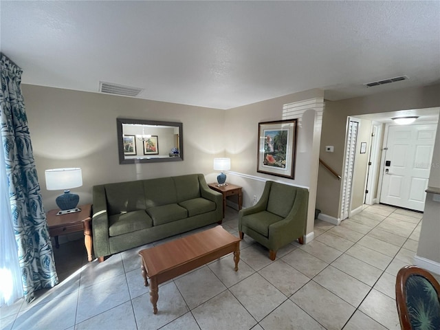 living room with light tile patterned floors