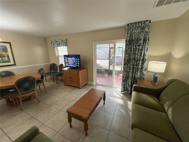 living room featuring light tile patterned floors