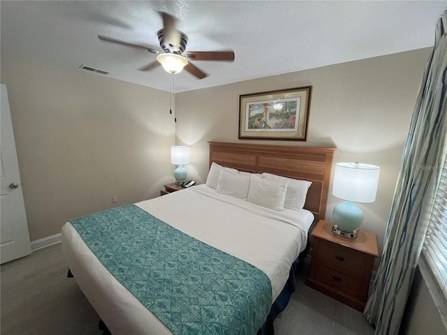 carpeted bedroom with ceiling fan