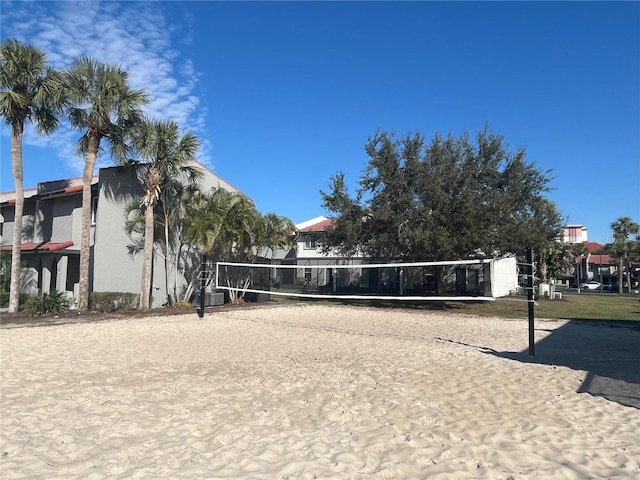 view of property's community featuring volleyball court