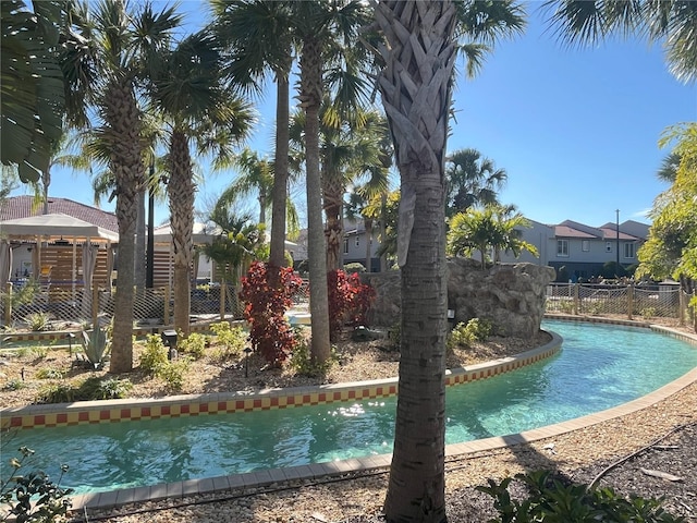 view of swimming pool featuring a gazebo