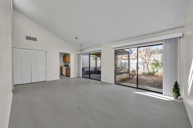 interior space featuring high vaulted ceiling