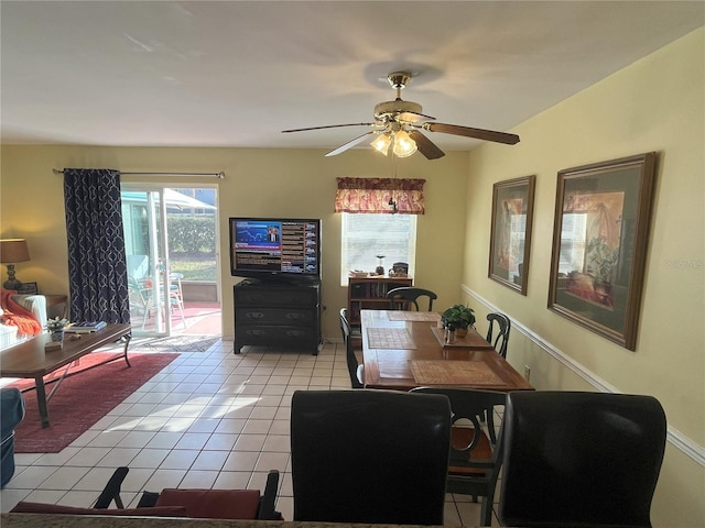 tiled dining room with ceiling fan