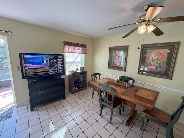 dining area featuring a wealth of natural light, ceiling fan, and light tile patterned floors